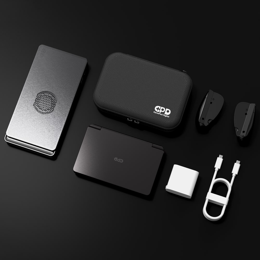 GPD-WIN_MINI_2024-MARKETING-IMAGE-8 - DROIX EU Image showcasing the GPD G1 2024 eGPU Docking Station, highlighting its AMD Radeon RX 7600M XT GPU, TGP Toggle Switch, and versatile connectivity options. Perfect for gamers and professionals seeking unparalleled performance and sleek design.