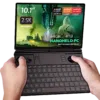 Image of the GPD Win Max 2 2025, a handheld gaming PC with a 10.1-inch 2.5K touchscreen display. It features AMD Ryzen AI Pro 9 HX and Radeon 8000 Series graphics. The device boasts up to 64GB RAM and up to 4TB M.2 SSD storage, with built-in gaming controls and a full QWERTY keyboard. The screen displays a futuristic gaming scene with vibrant visuals, emphasizing its advanced performance capabilities.