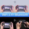 Een demonstratie van WiFi 2.4 en Bluetooth waarbij twee handhelds draadloos verbonden zijn en een Bluetooth-controller wordt gebruikt.