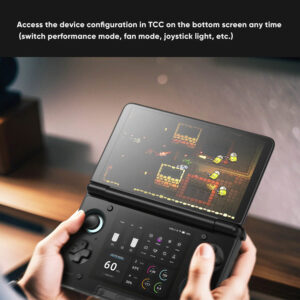 A close-up, first-person shot of a person's hands holding an open AYN Thor handheld gaming console. The top screen displays a pixel art game with a character shooting at enemies. The bottom screen shows a user interface with various icons and real-time performance data, including a framerate of "60 FPS". The text "Access the device configuration in TCC on the bottom screen any time (switch performance mode, fan mode, joystick light, etc.)" is at the top of the image.